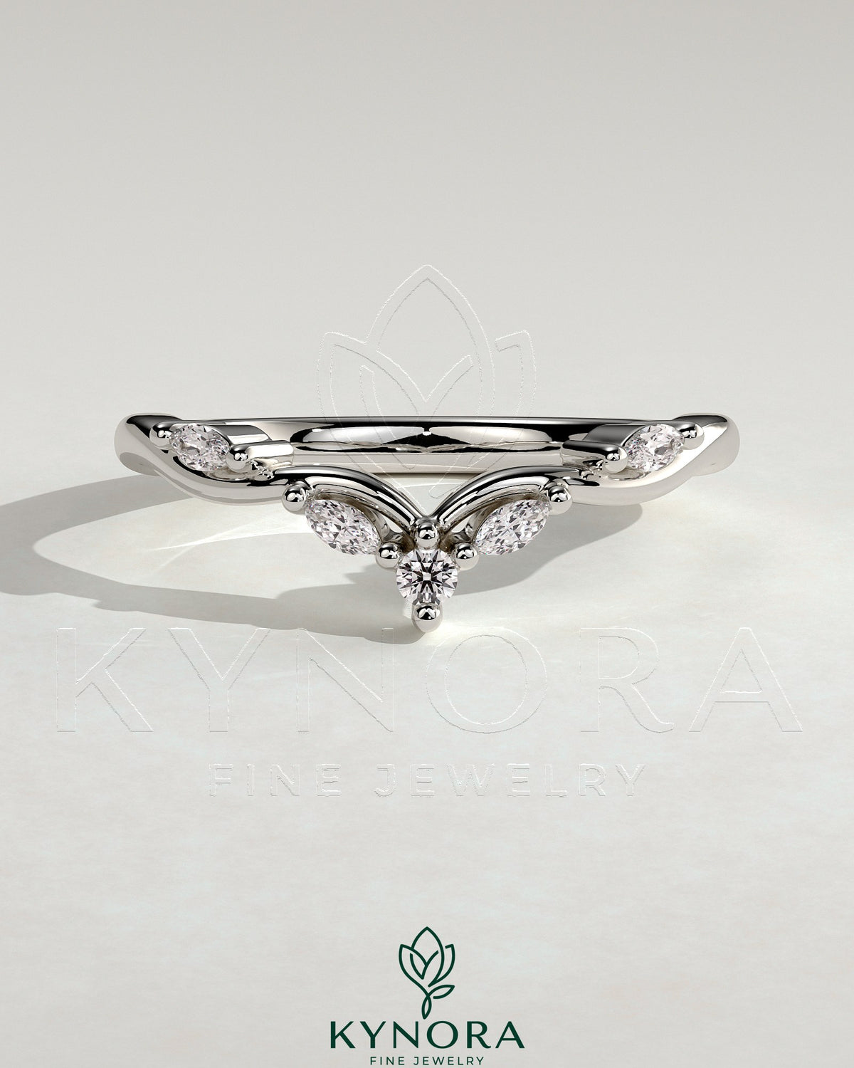 Kynora CJ wedding band featuring marquise and round accent stones with a vine design, crafted for elegant wedding jewelry.
