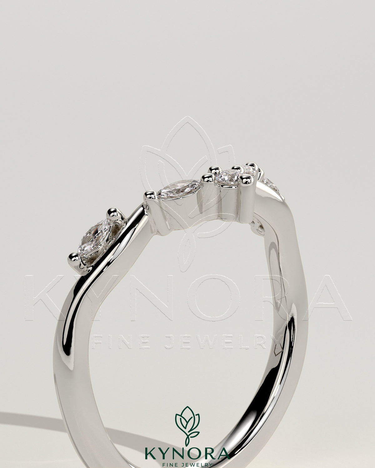 Kynora CJ wedding band with marquise and round accent stones in a vine design, crafted for elegant bridal jewelry.
