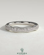Mixed size pave band wedding ring with milgrain detailing by Kynora CJ, showcasing intricate diamond setting and vintage-inspired design.