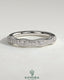 Mixed size pave band wedding ring with milgrain detailing by Kynora CJ, showcasing intricate diamond setting and vintage-inspired design.