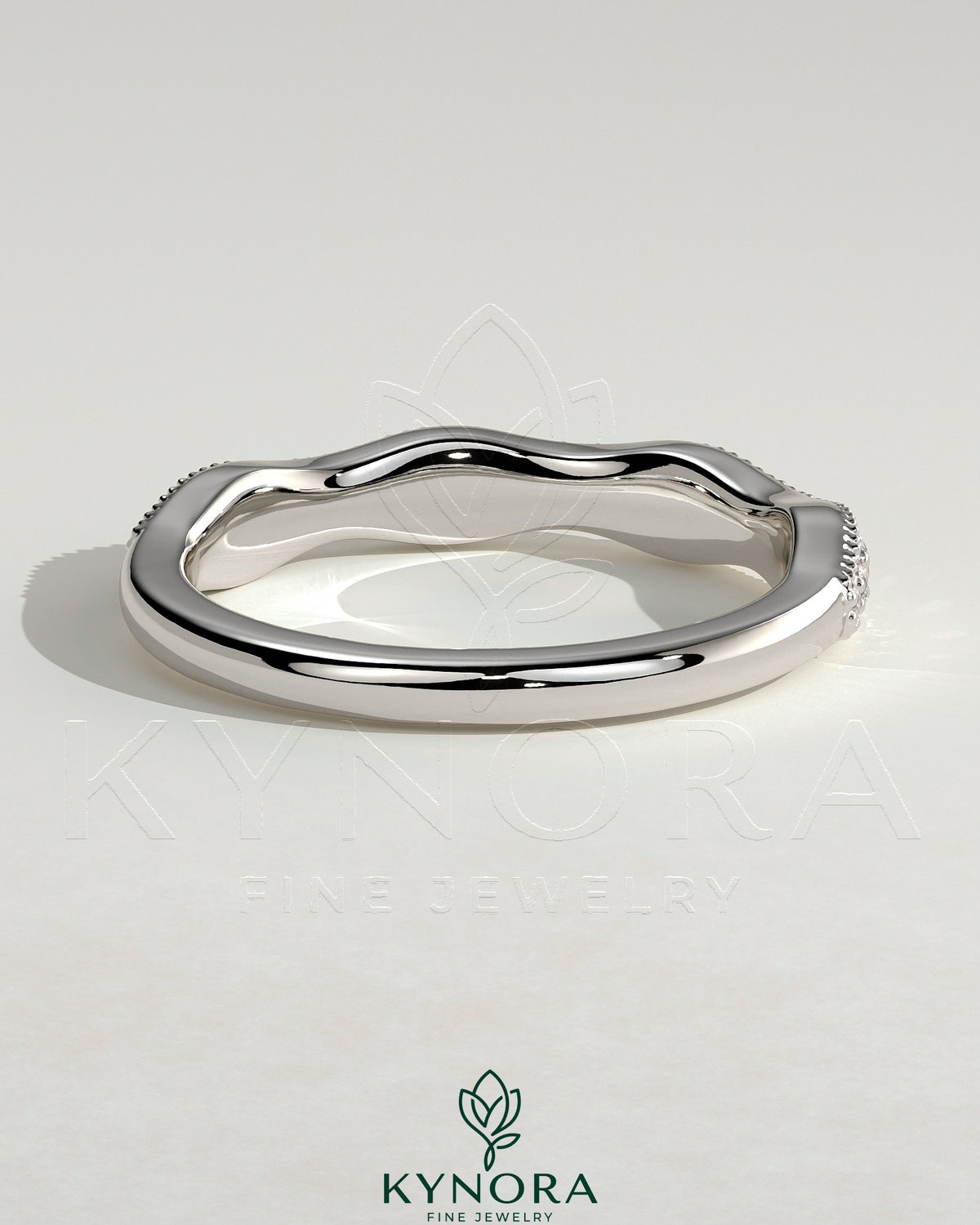 Mixed size pave band wedding ring with milgrain detailing by Kynora CJ, showcasing sparkling pave stones and intricate milgrain edges.