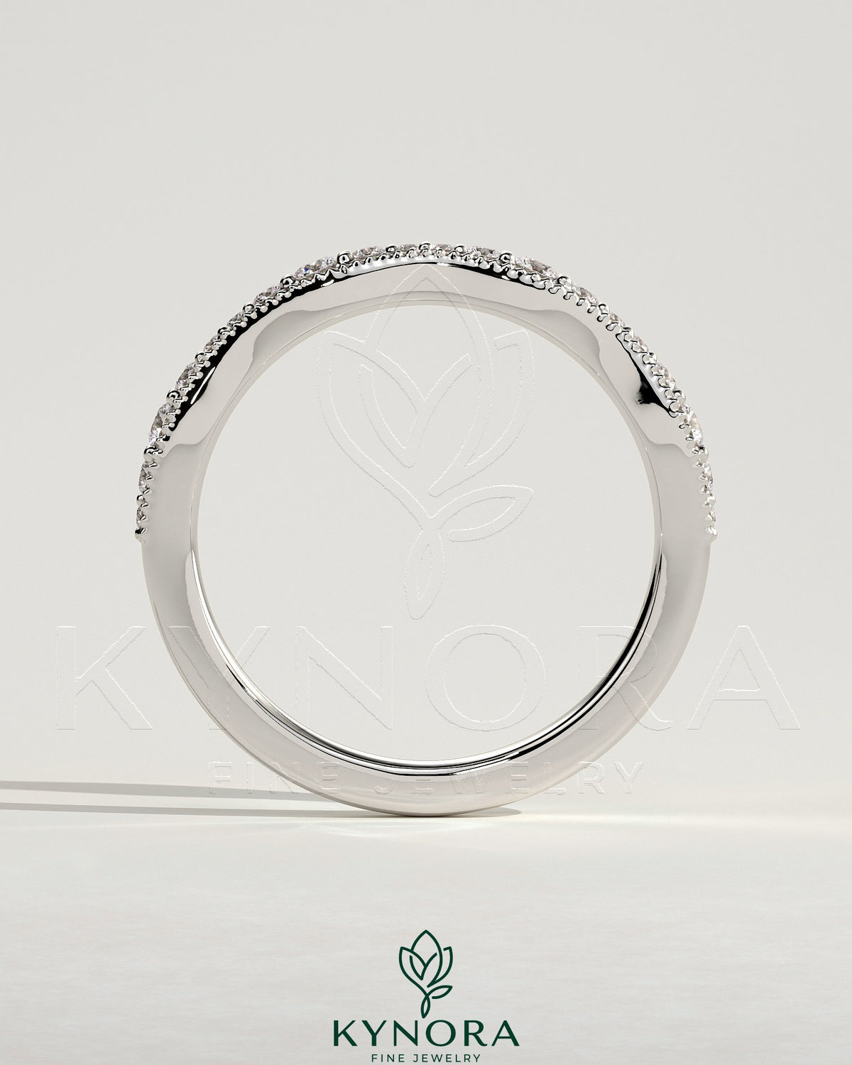 Mixed size pave band wedding ring with milgrain detailing by Kynora CJ, featuring sparkling pavé stones and intricate milgrain edges.