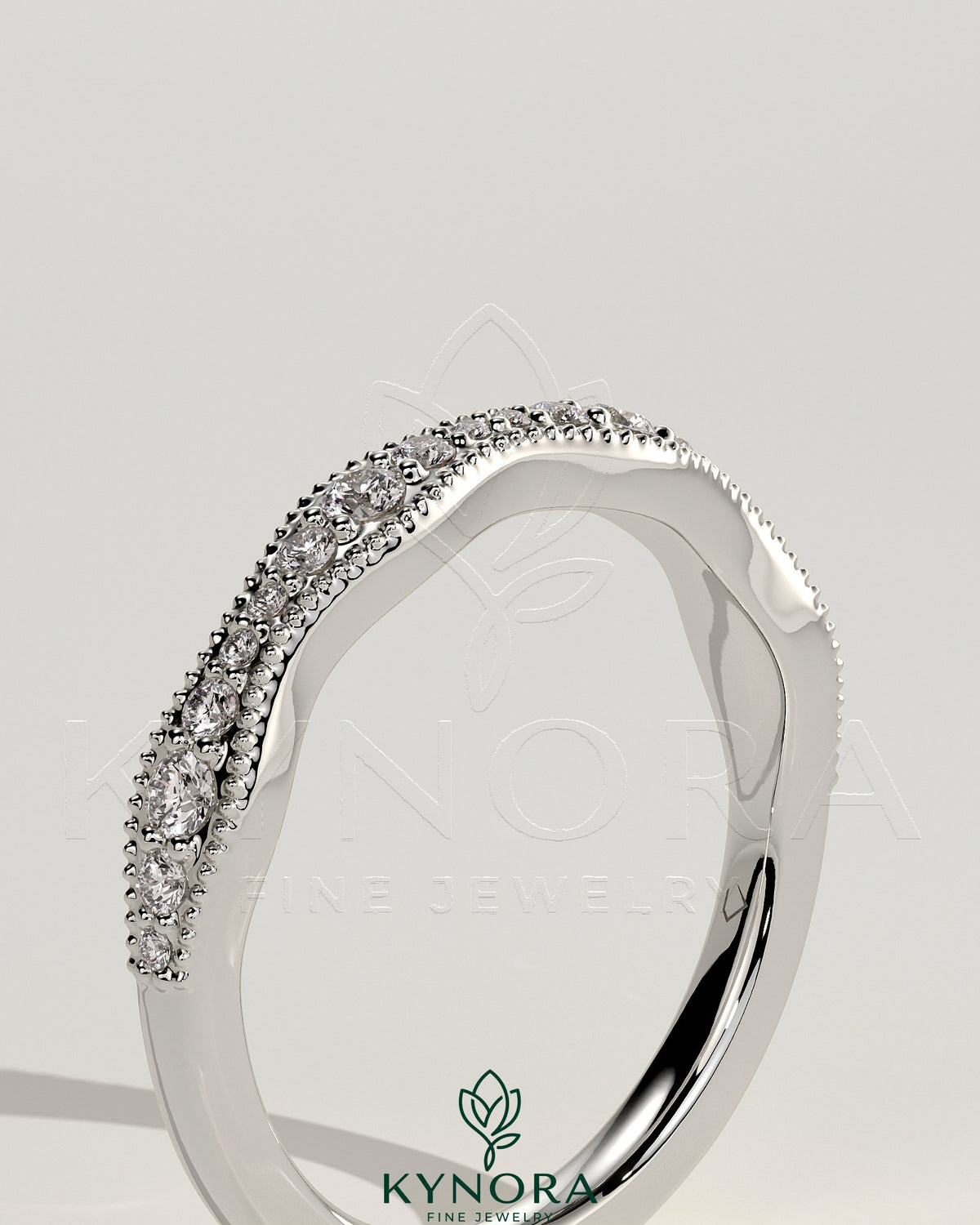 Kynora CJ mixed size pave band wedding ring with milgrain detail, showcasing a sparkling, elegant gold band for special occasions.
