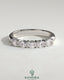 Kynora CJ sterling silver wedding band with oval east-west moissanite accent stone in closed basket setting