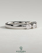 Kynora CJ Pear East West Accent Stone wedding band with closed basket setting, elegant gold wedding ring for women.