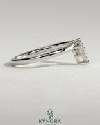 Kynora CJ Pear-shaped accent stone wedding band with curved design in silver, elegant jewelry for special occasions.