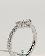 Kynora CJ Pear Round Accent Stone wedding band with curved pave band, elegant diamond jewelry for special occasions.