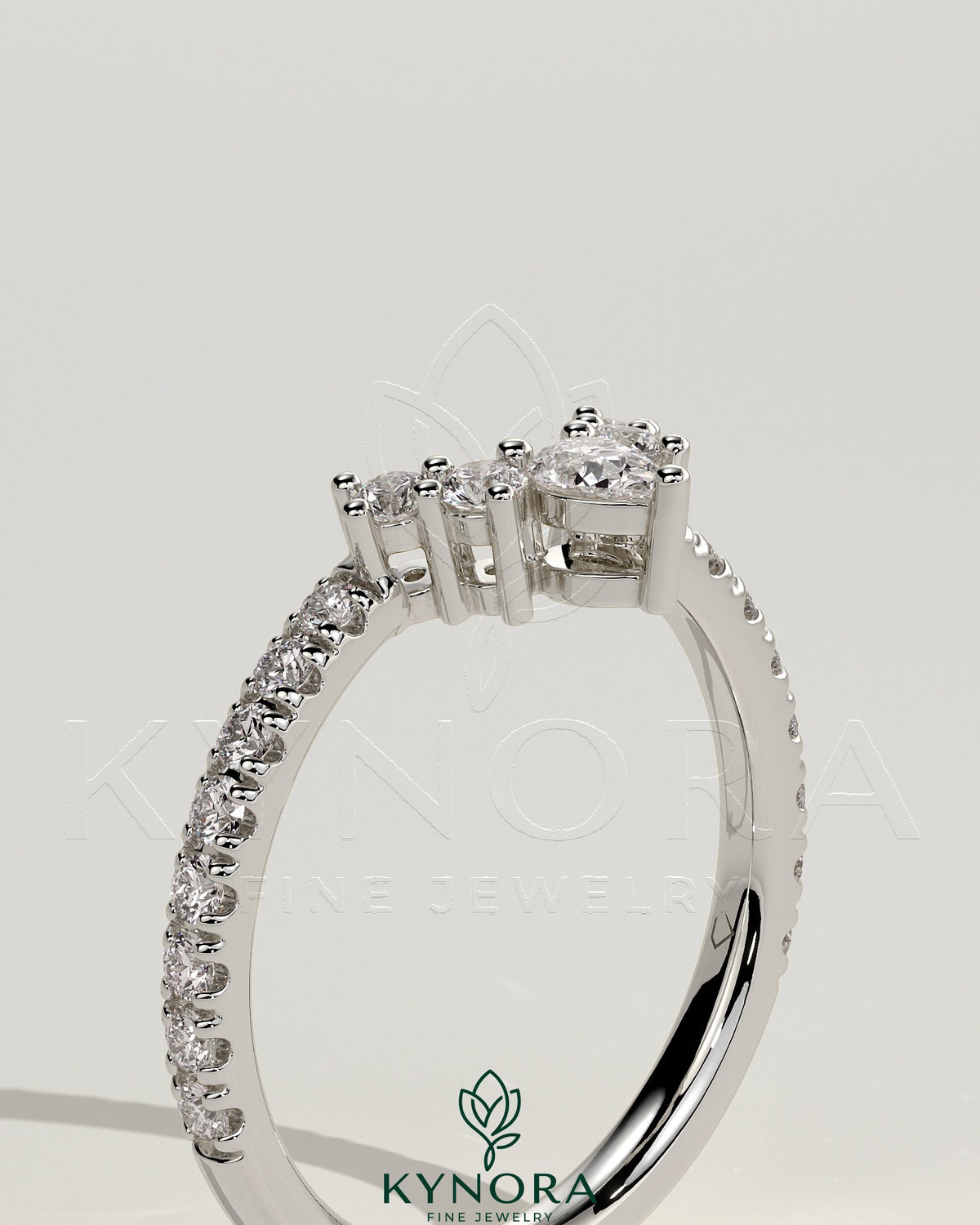 Kynora CJ Pear Round Accent Stone wedding band with curved pave band, elegant diamond jewelry for special occasions.