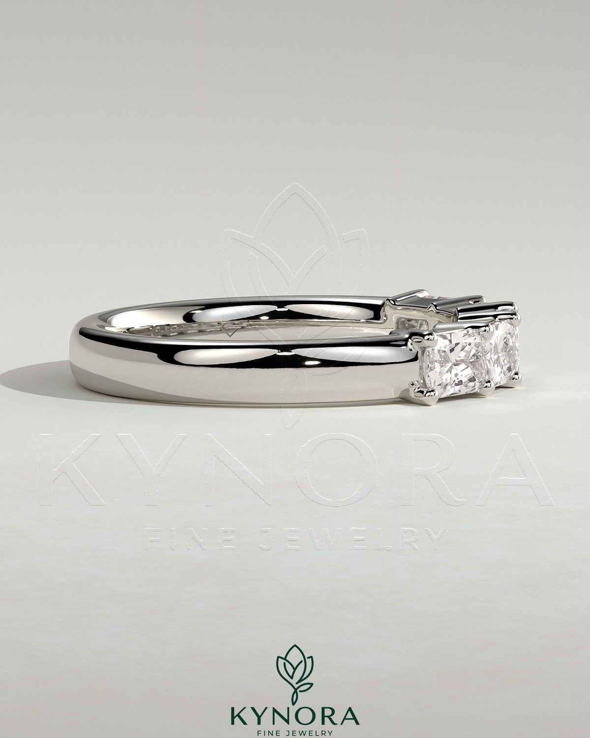 Kynora CJ radiant east-west accent wedding band with closed basket setting, featuring sparkling stones in a sleek gold design.