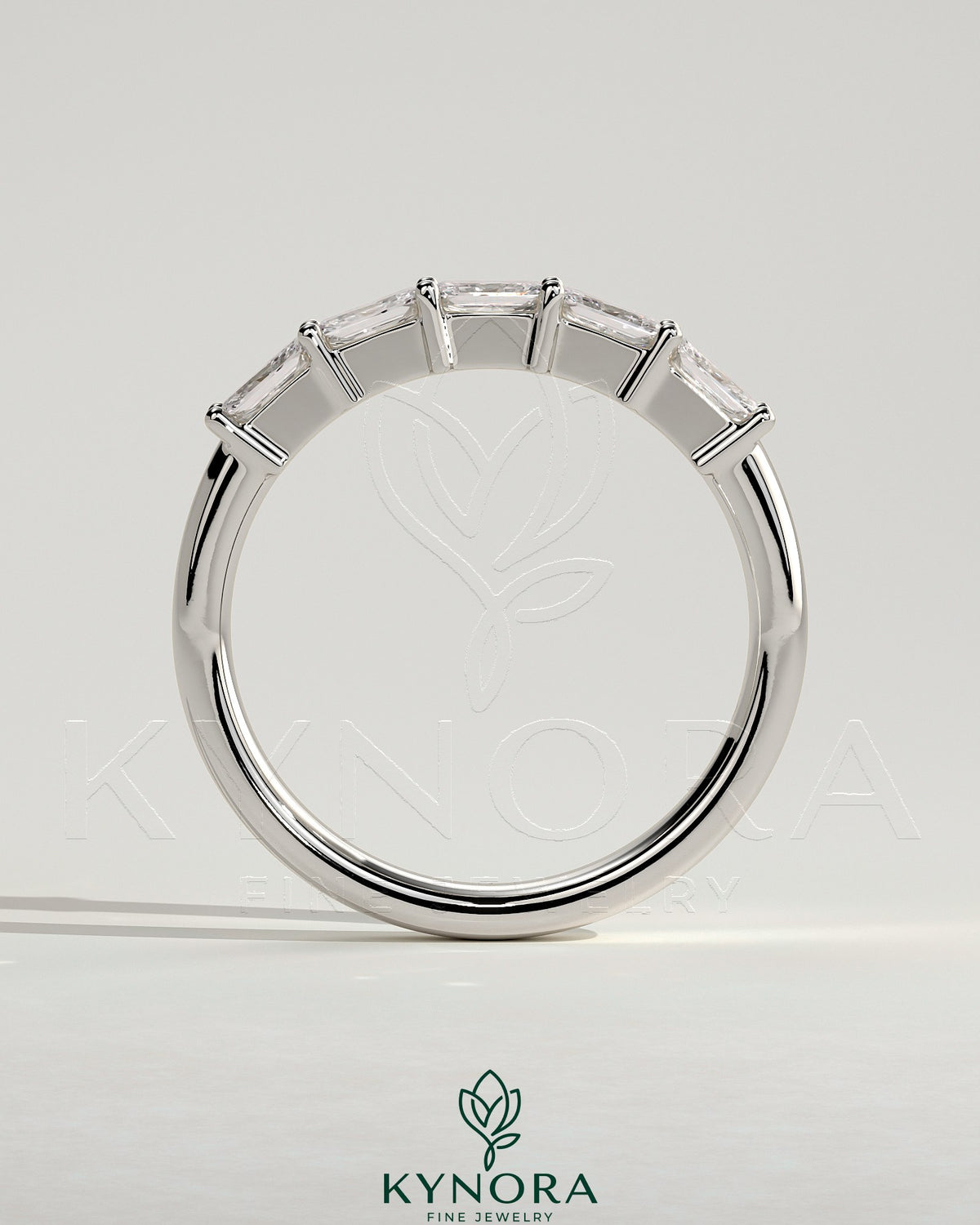 Kynora CJ Radiant East West Accent Stone wedding band with closed basket setting, showcasing sparkling gemstones and elegant design.