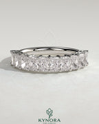 Kynora CJ Radiant Eternity Band Wedding Ring with sparkling gemstones, showcasing a continuous circle of brilliance.