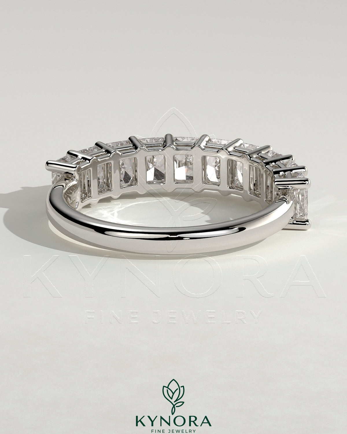 Kynora CJ radiant eternity band wedding ring with sparkling gemstones, sleek gold band, elegant and timeless jewelry piece