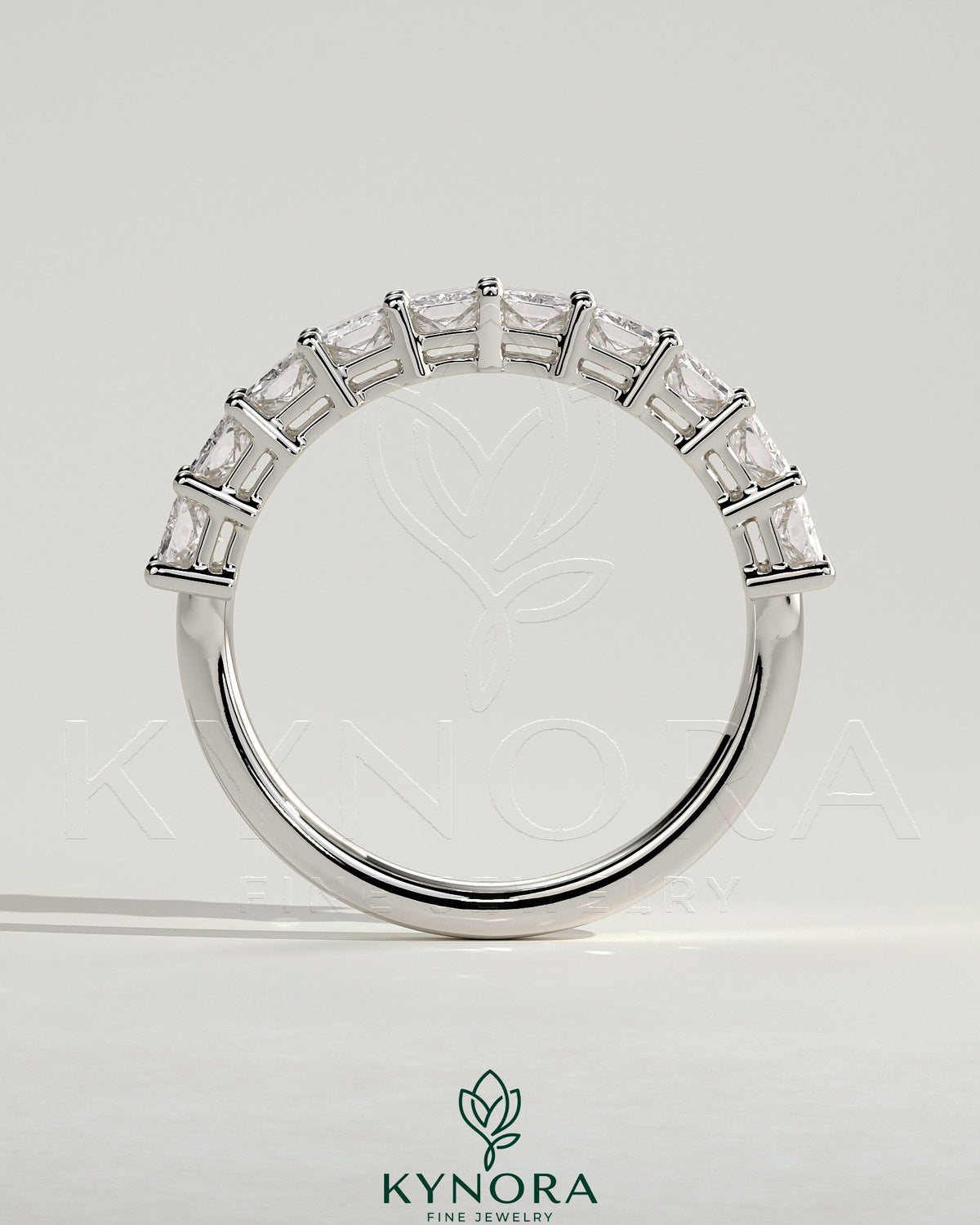 Kynora CJ Radiant Eternity Band wedding ring with sparkling gemstones, featuring a continuous row of brilliance on polished gold.