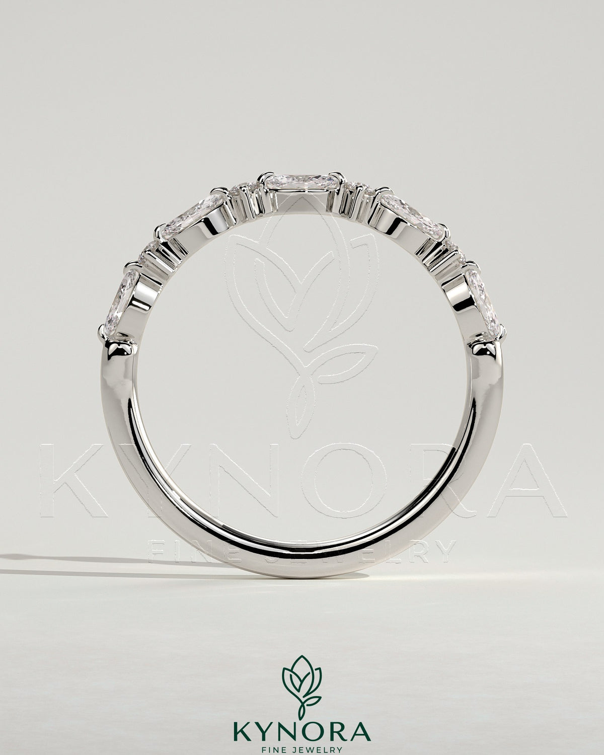 Kynora CJ round marquise accent wedding band with sparkling marquise-shaped stones, elegant gold finish, designed for bridal jewelry.