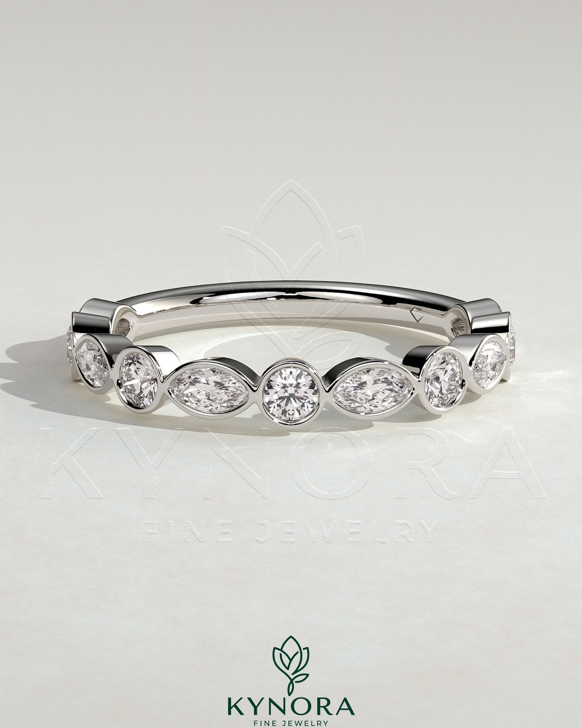 Kynora CJ round marquise bezel set wedding band with sparkling marquise diamonds on polished gold band Immagine principale del prodotto
