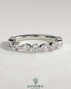Kynora CJ round marquise bezel set wedding band with sparkling marquise diamonds on polished gold band