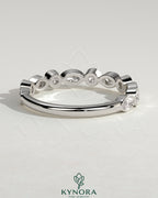 Kynora CJ round marquise bezel set wedding ring featuring a sleek band with marquise-shaped stones for elegant wedding jewelry