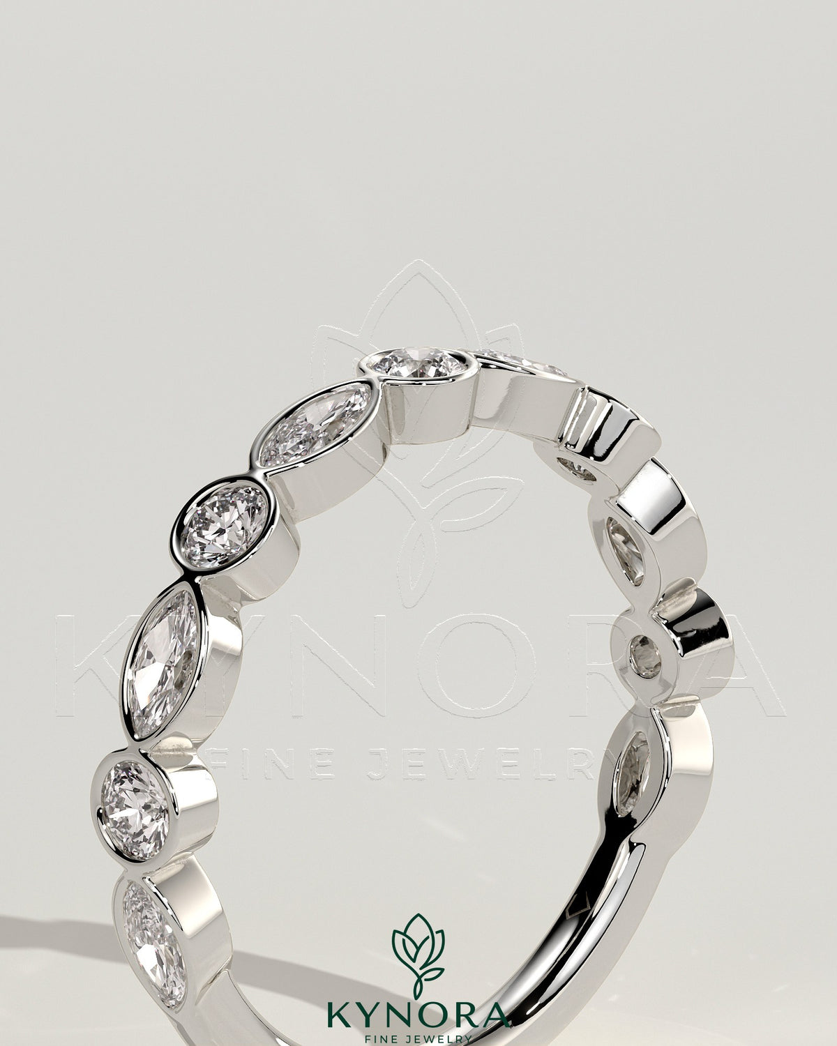 Kynora CJ round marquise bezel set wedding ring with elegant design, showcasing sparkling marquise-cut diamonds on a sleek band.