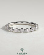 Kynora CJ round marquise wedding band with shared prong accent stones, elegant gold wedding ring for special occasions