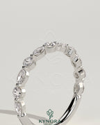 Kynora CJ Round Marquise Shared Prong Accent Stone Wedding Ring with sparkling marquise-cut stones on a sleek band