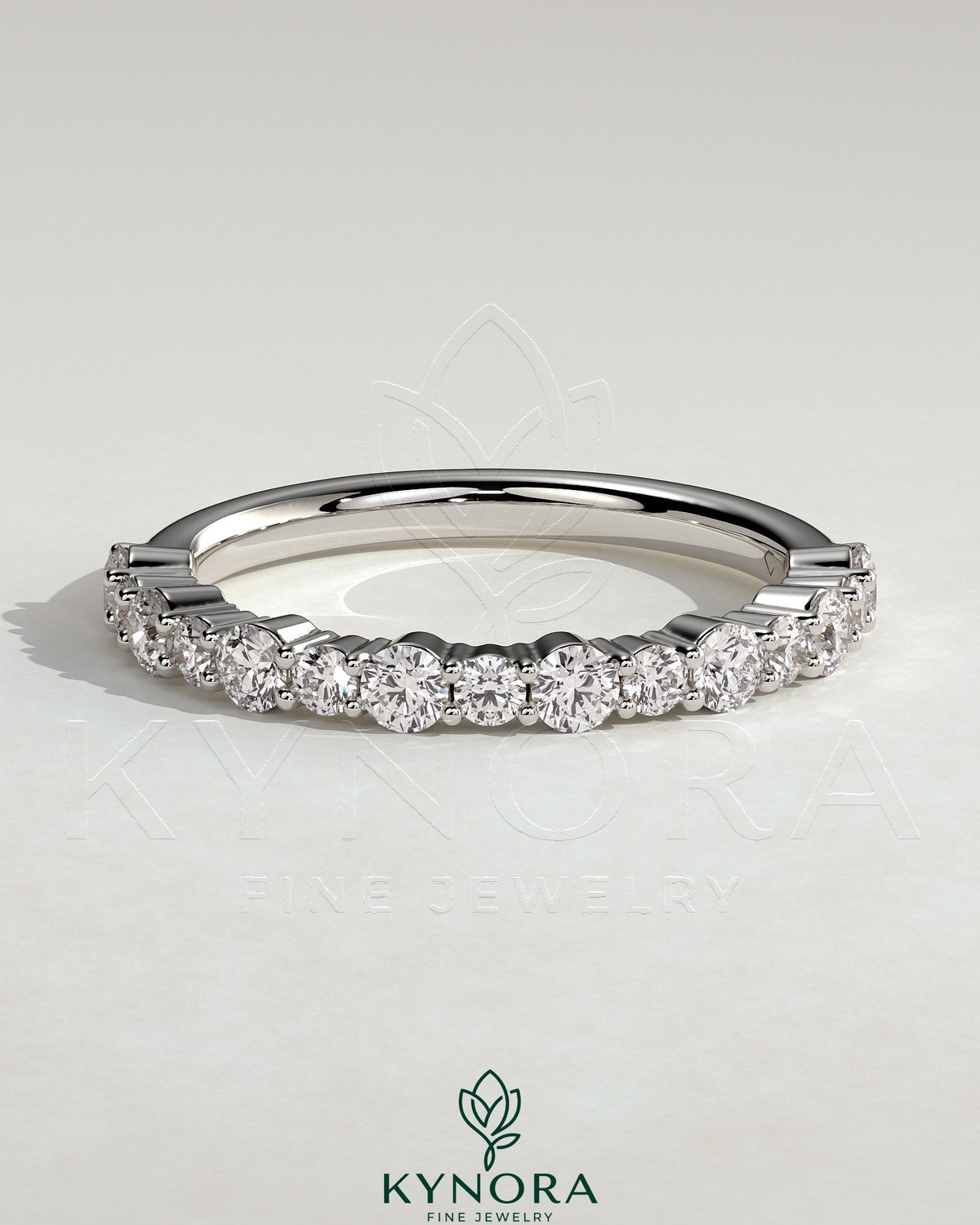 Kynora CJ round mixed size accent stone wedding band featuring multiple small stones, elegant and sparkling for special occasions.