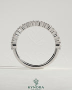 Kynora CJ round wedding band with mixed size accent stones, elegant jewelry for special occasions.