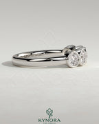Kynora CJ round bezel set wedding ring with a sleek band and sparkling central gemstone, elegant wedding band for special occasions