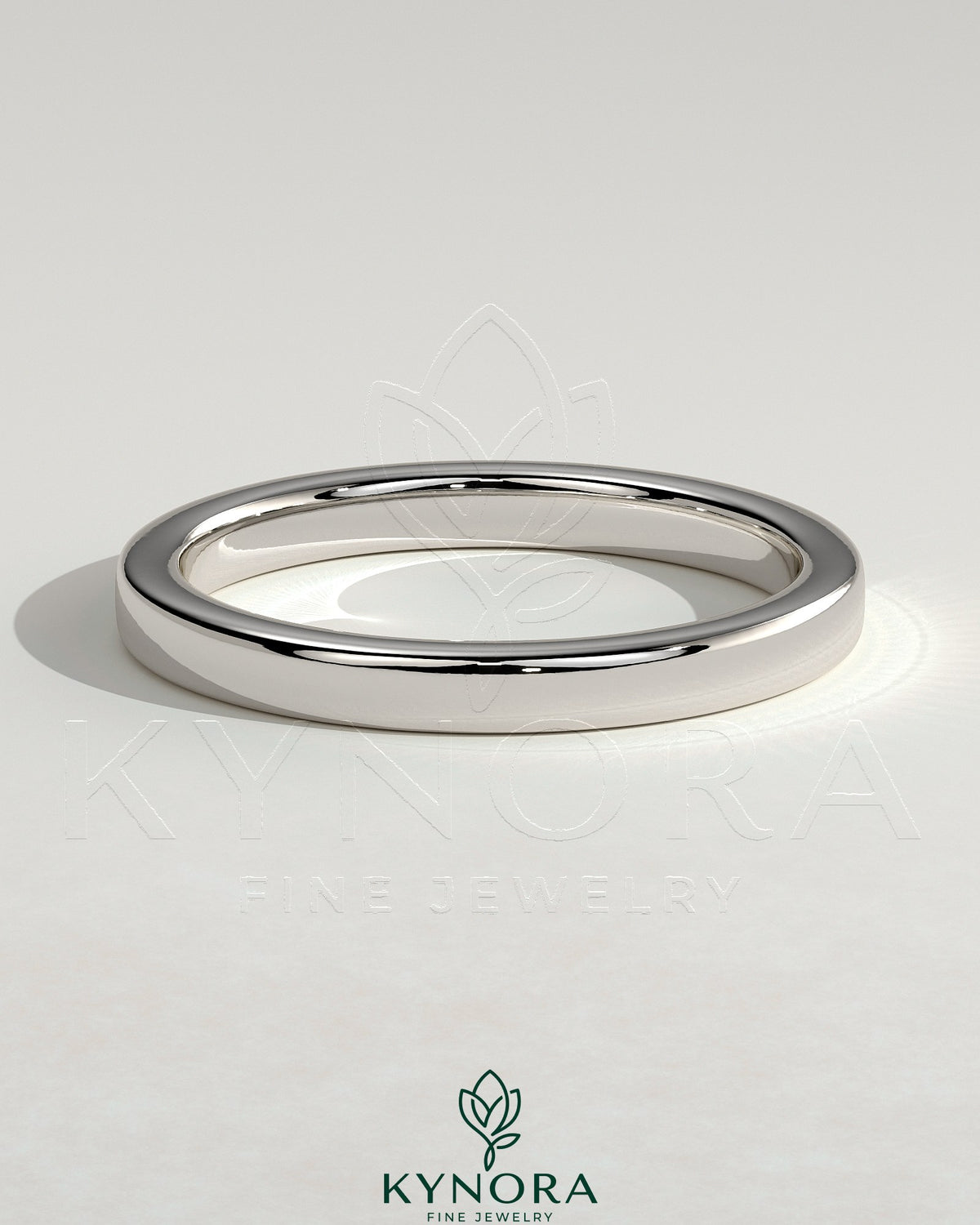 Kynora CJ round channel set wedding band with a sleek, polished gold finish, featuring a continuous row of sparkling gemstones.