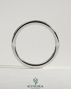 Kynora CJ round channel set wedding ring with sparkling stones, elegant wedding band for special occasions