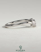 Kynora CJ Trillion Accent Stone wedding band with curved design, featuring a polished gold finish and sparkling accent stones.