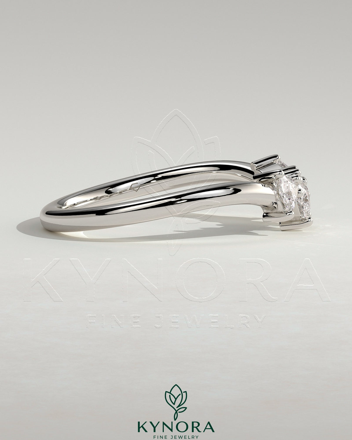 Kynora CJ Trillion Accent Stone wedding band with curved design, featuring a polished gold finish and sparkling accent stones.