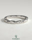 Kynora CJ twisted band wedding ring with elegant intertwined design, crafted in high-quality metal for special occasions.