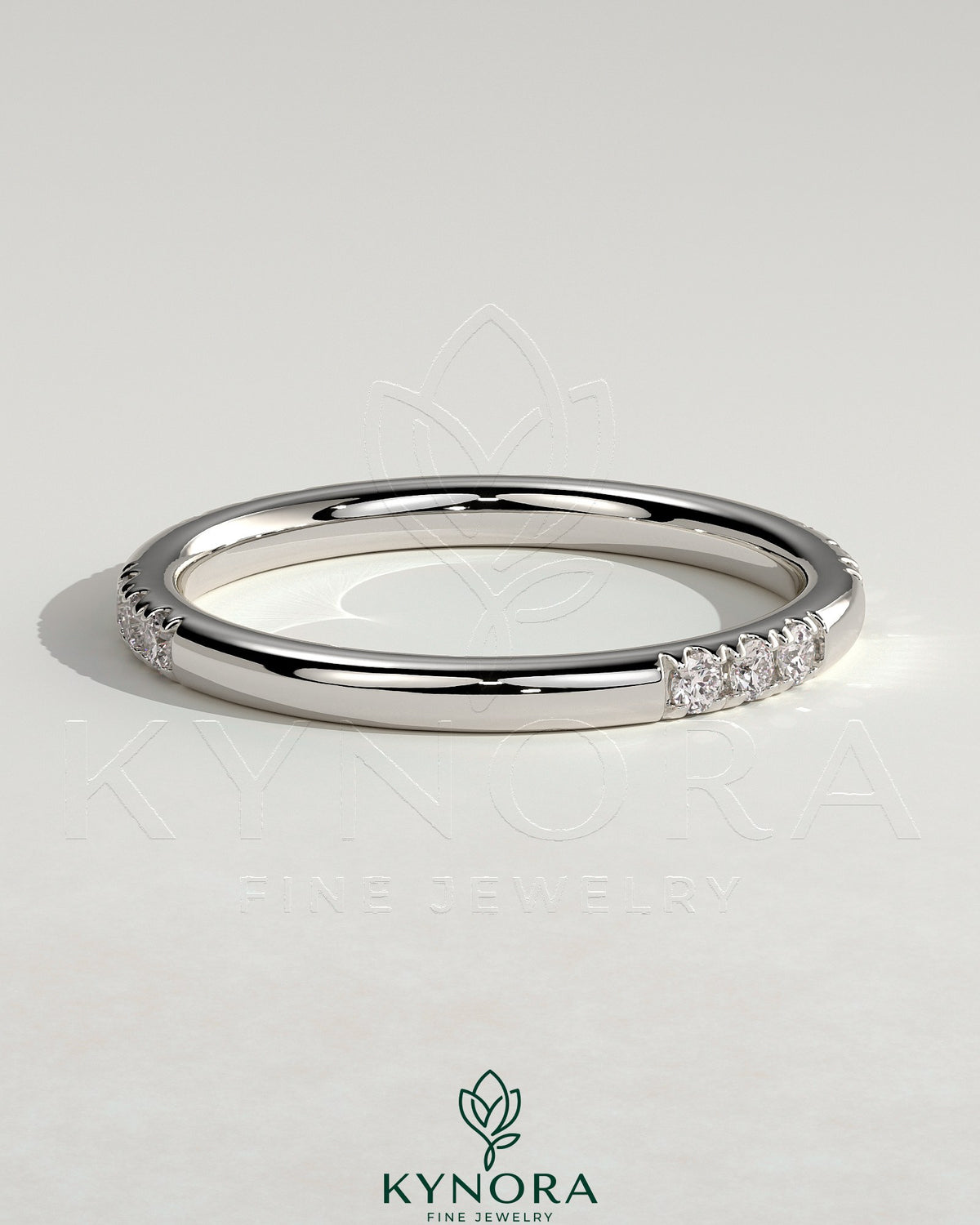 Two third spaced clustered pave wedding band ring by Kynora CJ with intricate diamond detailing and elegant design.