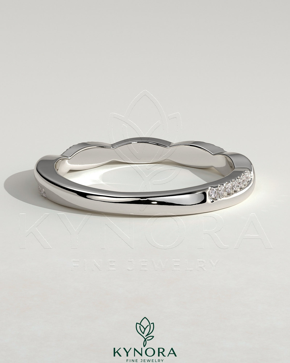 Kynora CJ Two Third Twisted Band wedding ring with pave accents, showcasing intricate design and sparkling details.