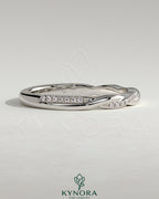 Kynora CJ twisted wedding band with pave detailing, elegant two-third design in sterling silver for special occasions.
