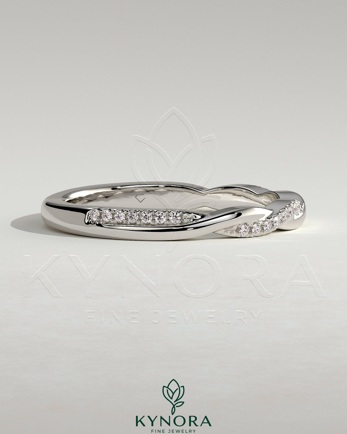 Kynora CJ twisted wedding band with pave detailing, elegant two-third design in sterling silver for special occasions.