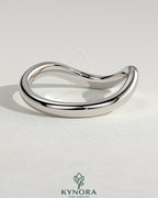 Kynora CJ Wave Band Wedding Ring with sleek, polished design, perfect for wedding jewelry, showcasing elegant craftsmanship.