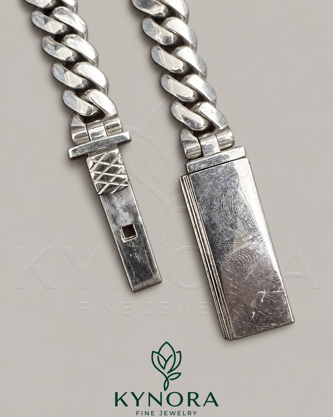10 mm plain Cuban link chain necklace in 10K white gold, hiphop style by Kynora Jewels, featuring a sleek, polished finish.