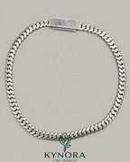 10mm plain Cuban link chain necklace in 10K white gold from Kynora Jewels, showcasing a polished hip-hop style design.
