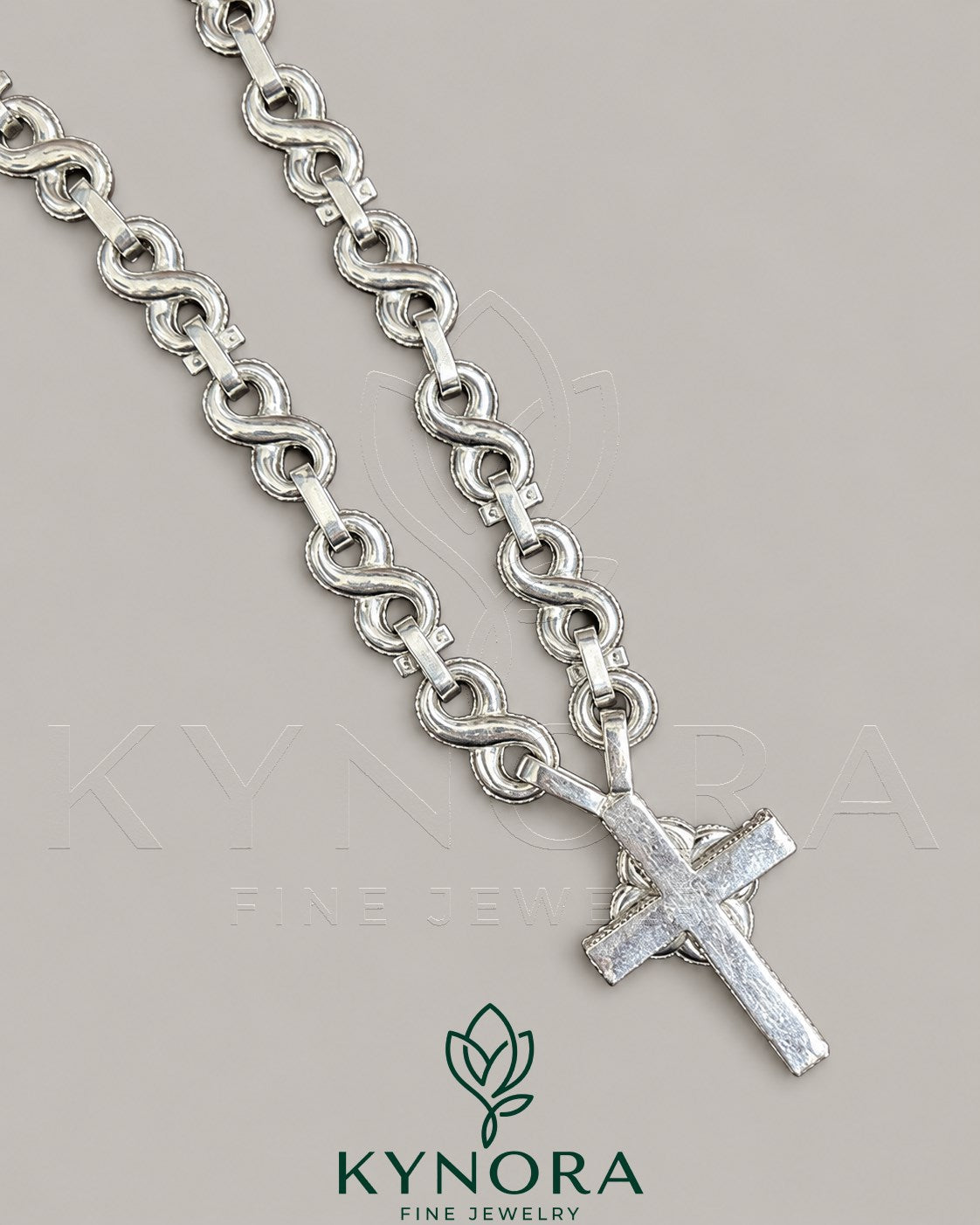 Sterling silver Cuban link chain and pendant set with 10mm VVS Moissanite diamonds by Kynora Jewels, hiphop jewelry style.
