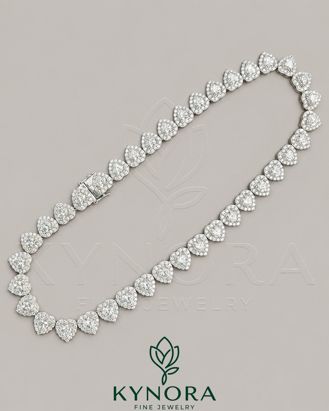 Heart-shaped moissanite diamond hiphop chain in 10mm silver tennis link, featuring Kynora Jewels branding.