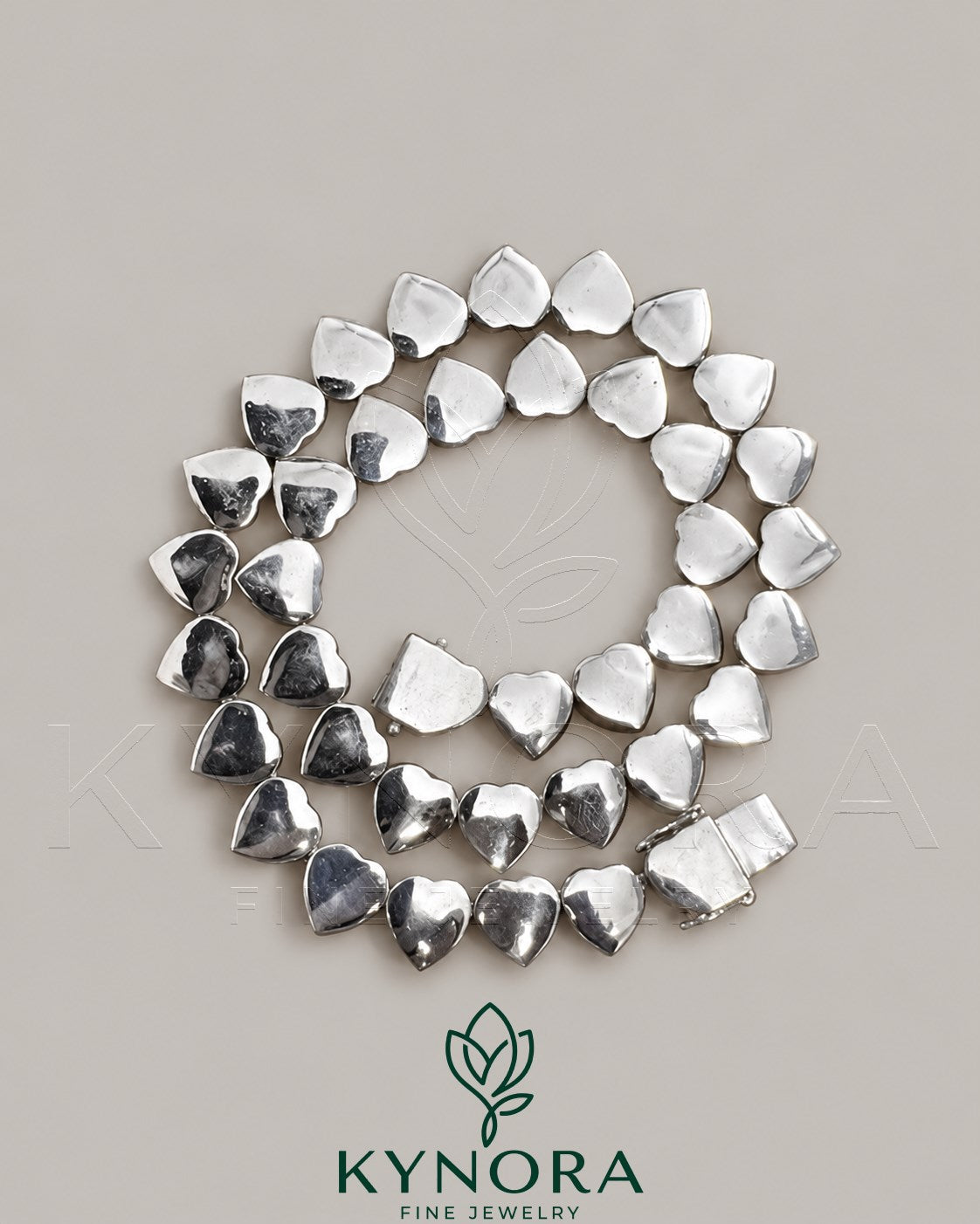Kynora Jewels 10mm moissanite diamond heart-shaped silver tennis chain, hip-hop style, with linked chain design.