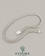 Sterling silver Cuban link chain with 10mm VVS Moissanite, hiphop style jewelry from Kynora Jewels