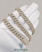 Sterling silver VVS moissanite Cuban link chain, 10mm hip-hop style jewelry from Kynora Jewels with sparkling gemstone accents.