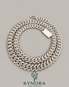 Sterling silver 10mm VVS moissanite Cuban link chain by Kynora Jewels, showcasing its shiny, chunky hip-hop chain style.