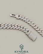 Sterling silver Cuban link chain with 10mm VVS moissanite stones, hip-hop jewelry style by Kynora Jewels