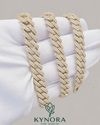 Sterling silver 10mm VVS moissanite Cuban link chain hip-hop jewelry by Kynora Jewels, close-up of the sparkling chain.