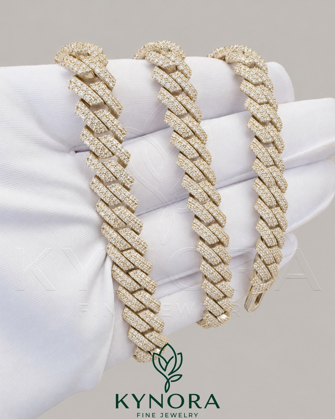 Sterling silver 10mm VVS moissanite Cuban link chain hip-hop jewelry by Kynora Jewels, close-up of the sparkling chain.