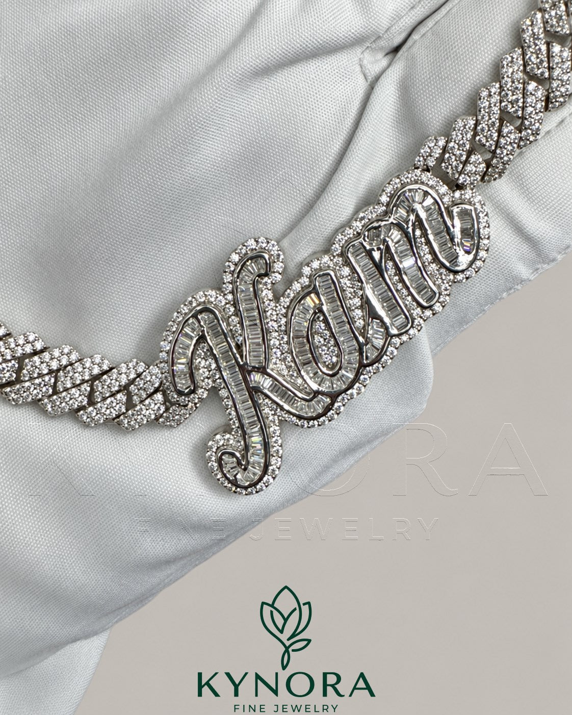 Sterling silver Cuban link chain with VVS moissanite diamonds and a customized name pendant, hiphop jewelry by Kynora Jewels.