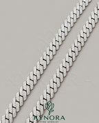 Kynora Jewels 18-inch sterling silver Miami Cuban link chain with 10mm VVS moissanite diamonds and custom lock closure.